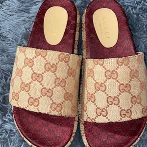 Gucci platform clogs .